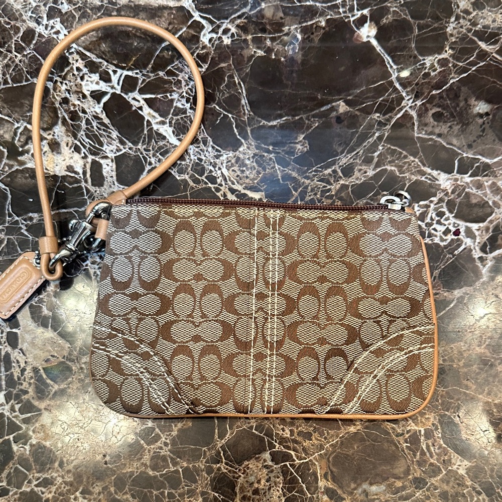 Coach Wristlet. Cute small size.
